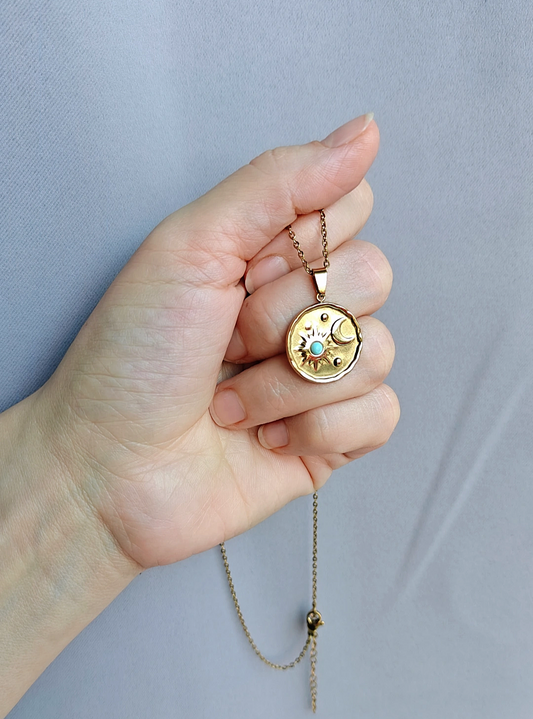 Auringon ja kuun rytmi kaulakoru